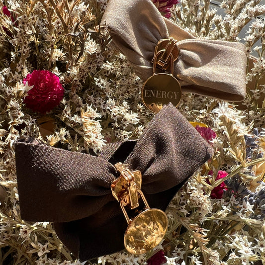 Engraved energy bracelet with gold pendant on fabric bow handcrafted in Italy for energy alignment and mindfulness
