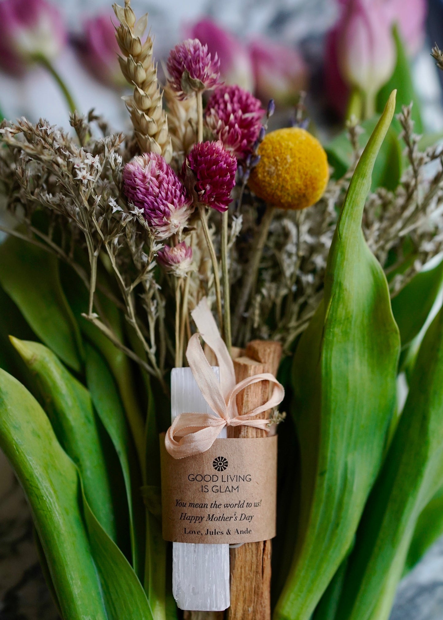 Uplifting Palo Santo Selenite floral bouquet with dried pink, white, and yellow blooms and selenite crystal centerpiece