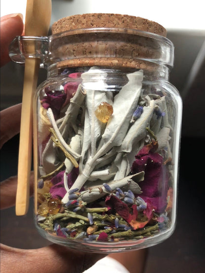 Nourish Your Energy Herbal Incense jar with abalone shell, dry brush, and lavender eye pillow for a calming bath ritual